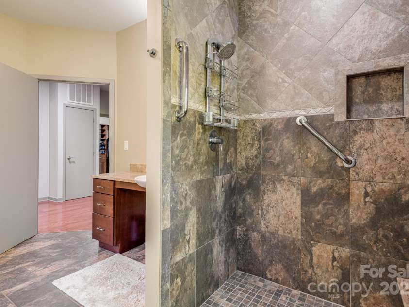 1760 Winding Creek Drive, Waynesville, NC 28786.  MLS# CAR4264715, YatesRealty ID 16223. Walk in shower
