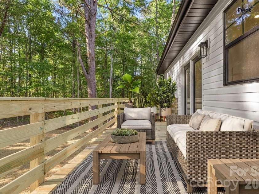 2277 Pacer Drive, Lancaster, SC 29720.  MLS# CAR4370344, YatesRealty ID 16225. Rear deck overlooking the serene rear yard 
