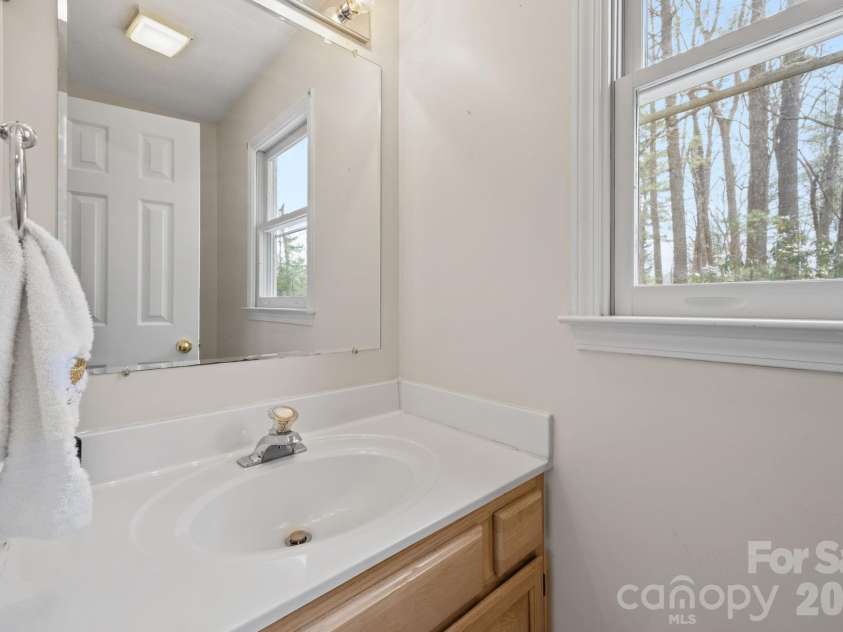 1618 Brookside Camp Road, Hendersonville, NC 28792.  MLS# CAR4365657, YatesRealty ID 16231. Downstairs Half Bath