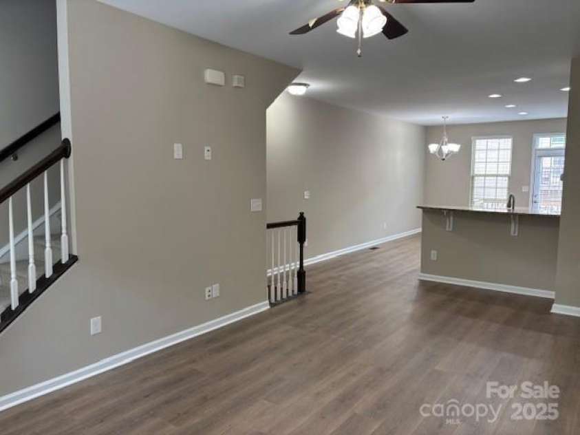 13838 Winmau Lane, Huntersville, NC 28078.  MLS# CAR4256068, YatesRealty ID 16237. Full view of the open living on the 2nd floor - all new flooring and paint throughout