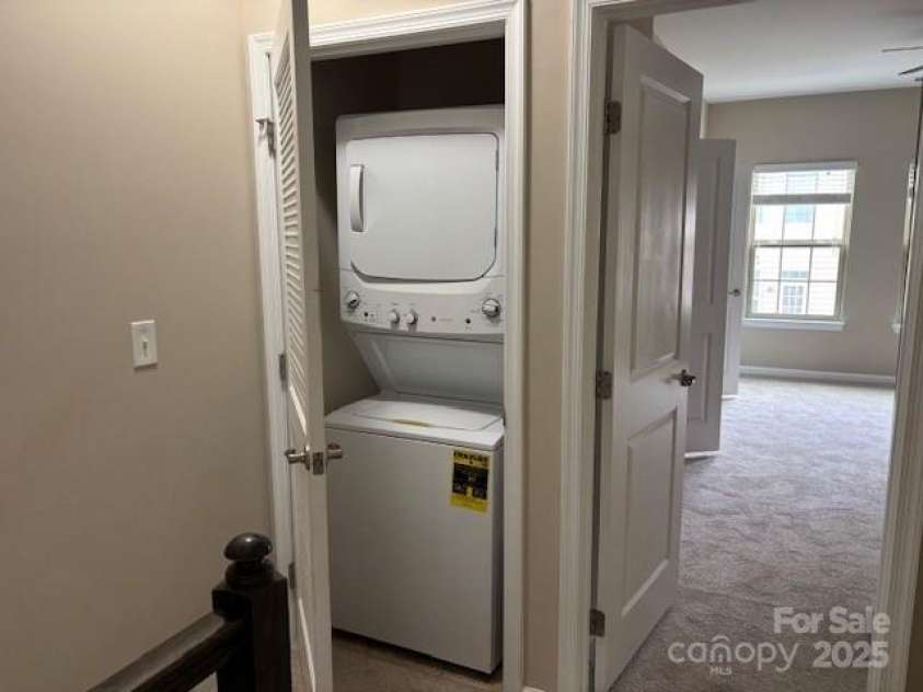 13838 Winmau Lane, Huntersville, NC 28078.  MLS# CAR4256068, YatesRealty ID 16237. Laundry accommodates both bedrooms on the 3rd level