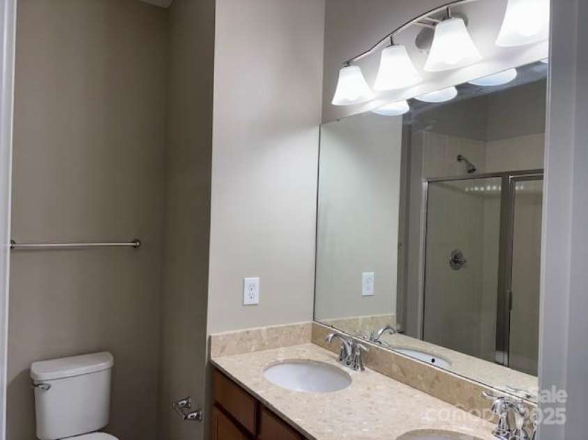 13838 Winmau Lane, Huntersville, NC 28078.  MLS# CAR4256068, YatesRealty ID 16237. Primary bath with double sinks - shower with dual shower heads -