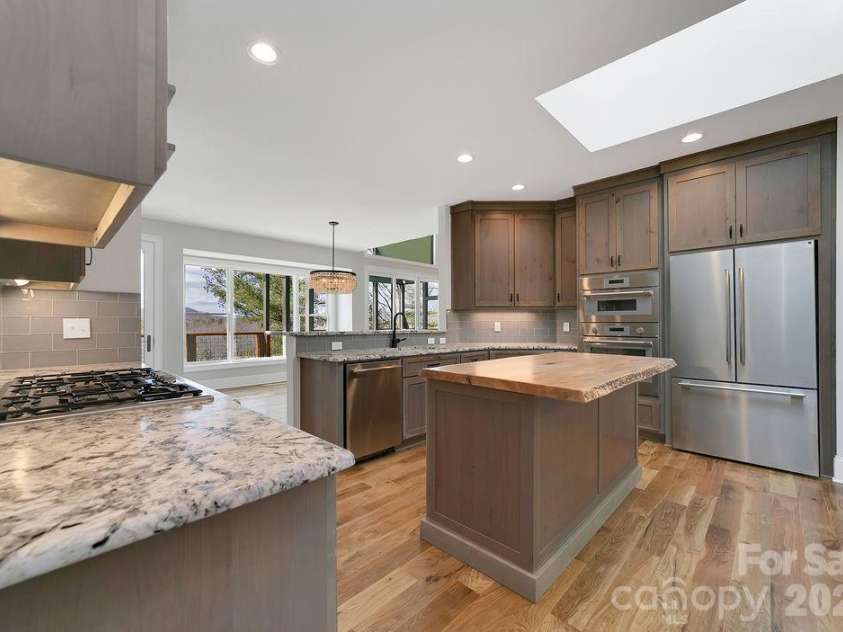 5039 Connestee Trail, Brevard, NC 28712.  MLS# CAR4324412, YatesRealty ID 1624. 