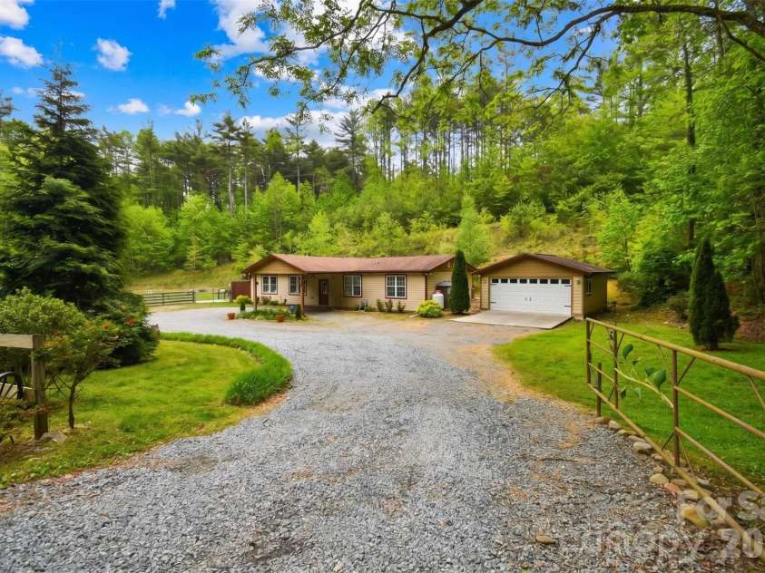 945 Country Club Road, Brevard, NC 28712.  MLS# CAR4374960, YatesRealty ID 16240. 
