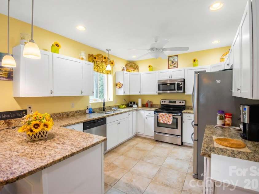 945 Country Club Road, Brevard, NC 28712.  MLS# CAR4374960, YatesRealty ID 16240. 