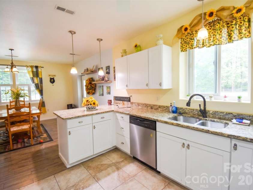 945 Country Club Road, Brevard, NC 28712.  MLS# CAR4374960, YatesRealty ID 16240. 