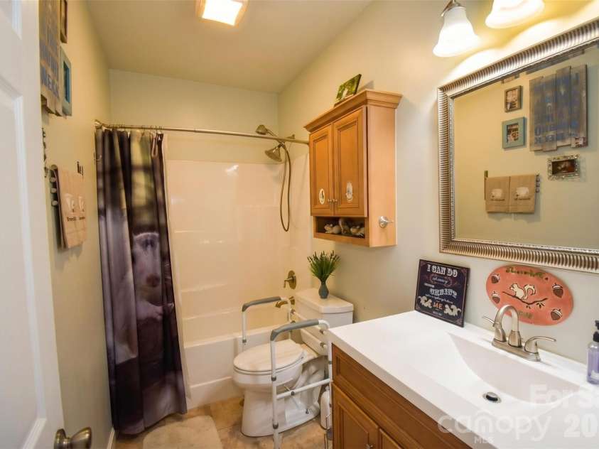 945 Country Club Road, Brevard, NC 28712.  MLS# CAR4374960, YatesRealty ID 16240. 