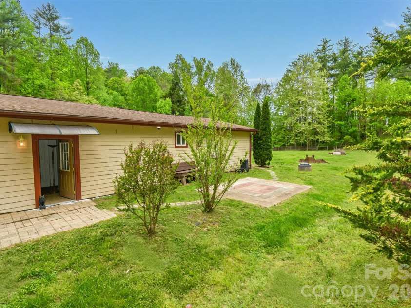 945 Country Club Road, Brevard, NC 28712.  MLS# CAR4374960, YatesRealty ID 16240. 
