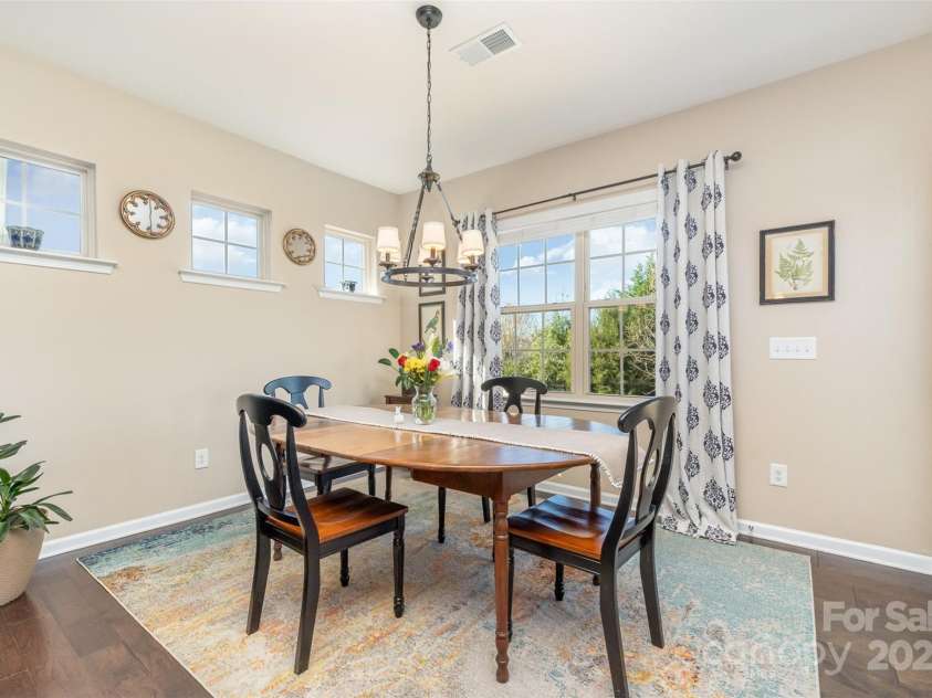 3034 Oakmere Road, Waxhaw, NC 28173.  MLS# CAR4235742, YatesRealty ID 16241. Dining Area with doors to Backyard Patio