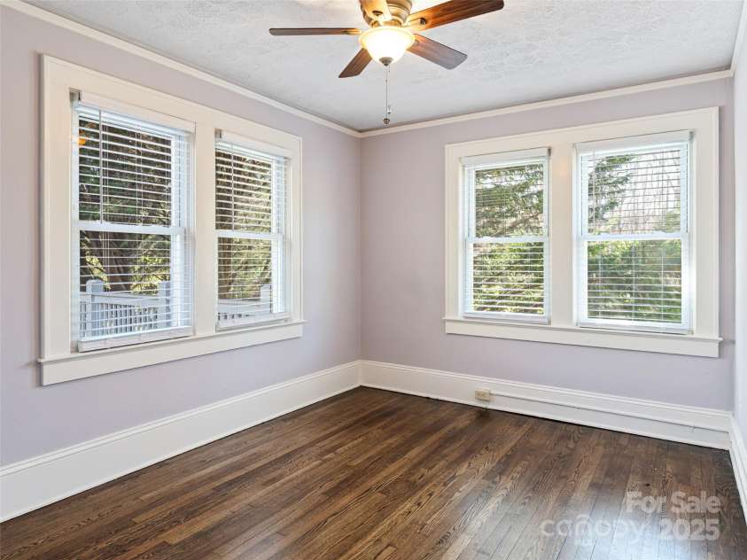 1305 Pisgah Highway, Candler, NC 28715.  MLS# CAR4245961, YatesRealty ID 16242. Back bedroom with lots of natural light
