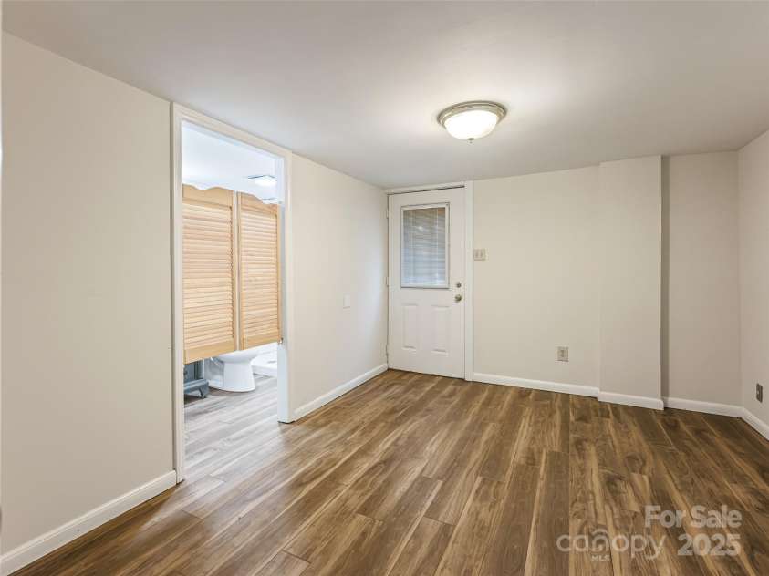 1305 Pisgah Highway, Candler, NC 28715.  MLS# CAR4245961, YatesRealty ID 16242. Bonus room in basement, great man cave.