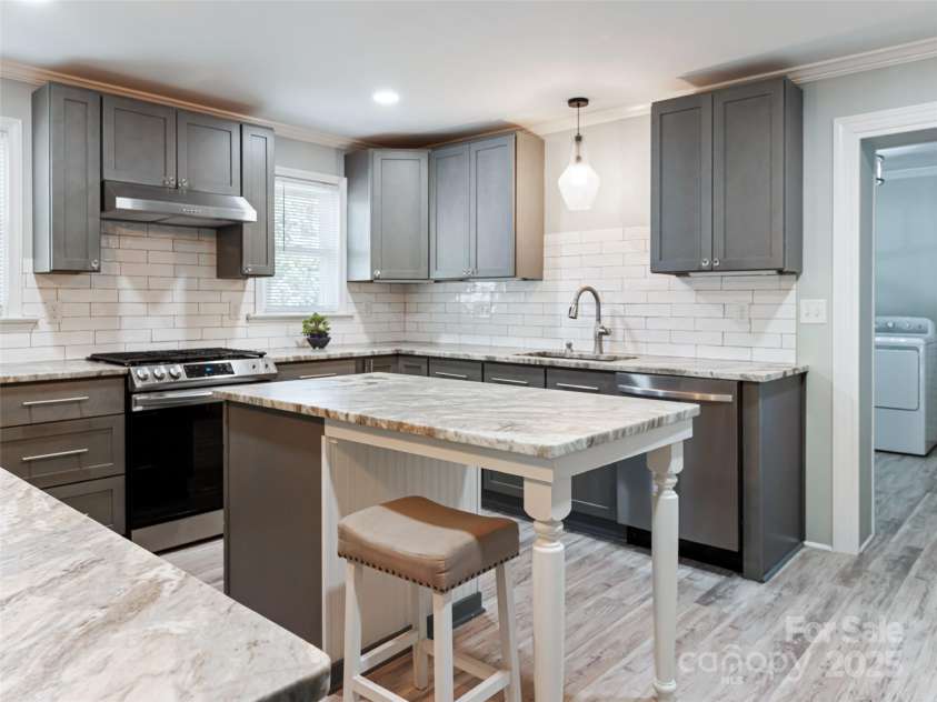 1305 Pisgah Highway, Candler, NC 28715.  MLS# CAR4245961, YatesRealty ID 16242. Huge chefs kitchen.