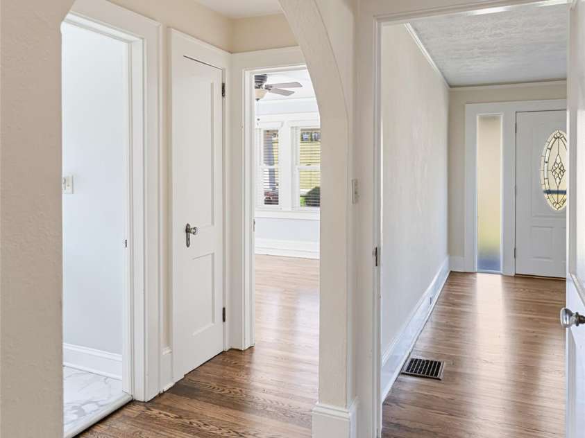 1305 Pisgah Highway, Candler, NC 28715.  MLS# CAR4245961, YatesRealty ID 16242. Lovely hallway between bedrooms and bath.