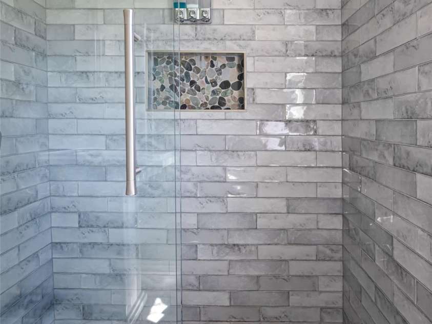 1305 Pisgah Highway, Candler, NC 28715.  MLS# CAR4245961, YatesRealty ID 16242. New shower with beautiful tile and full glass doors