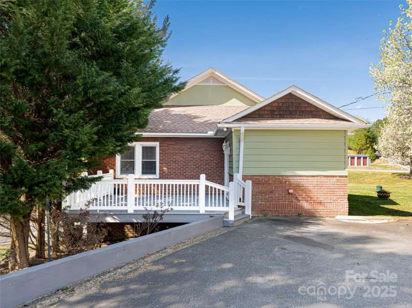 1305 Pisgah Highway, Candler, NC 28715.  MLS# CAR4245961, YatesRealty ID 16242. Parking on main level.