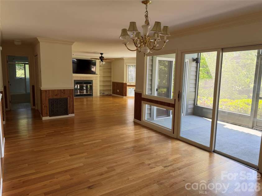 111 Burning Tree Lane, Flat Rock, NC 28731.  MLS# CAR4375443, YatesRealty ID 16248. Dining Area with access to screened porch