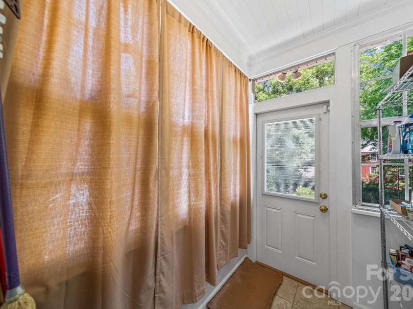 729 Montgomery Avenue, Albemarle, NC 28001.  MLS# CAR4375078, YatesRealty ID 16253. Back Porch - Utility Room