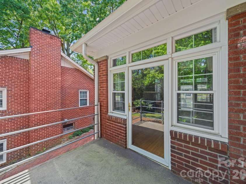 729 Montgomery Avenue, Albemarle, NC 28001.  MLS# CAR4375078, YatesRealty ID 16253. Rear Terrace/Porch off the side sunroom