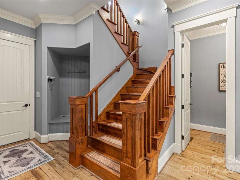 106 Kent Court, Mooresville, NC 28117.  MLS# CAR4262934, YatesRealty ID 16257. Main floor stairs up to second floor