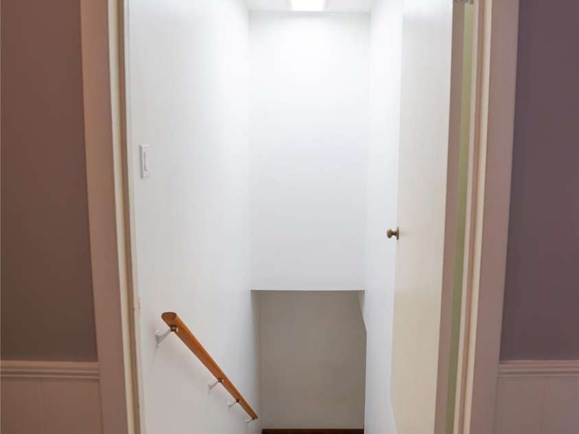 262 Rooster Cove, Brevard, NC 28712.  MLS# CAR4332799, YatesRealty ID 1626. Downstairs access located in hallway