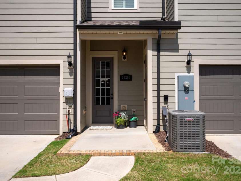 20216 Shaffer Bach Lane, Charlotte, NC 28277.  MLS# CAR4264477, YatesRealty ID 16262. Covered Back Entrance with 2 Car Garage