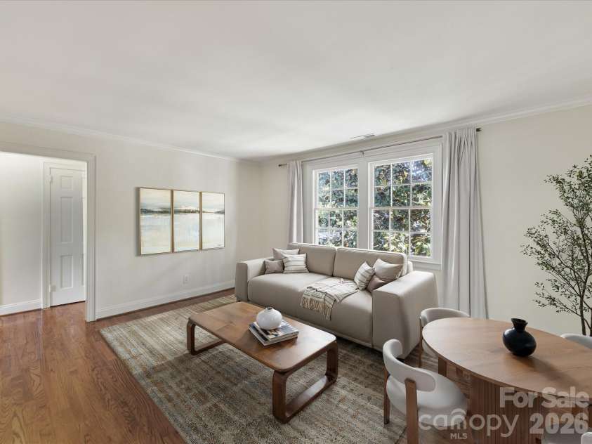 103 Laurel Avenue, Charlotte, NC 28207.  MLS# CAR4369312, YatesRealty ID 16267. Living room virtually staged