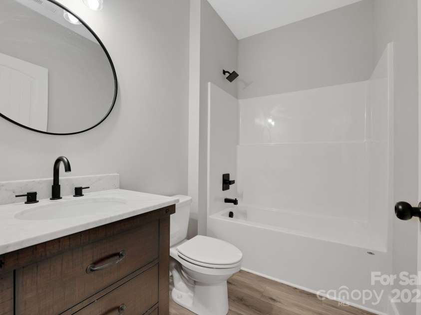 252 Big Lick Road, Stanfield, NC 28163.  MLS# CAR4250112, YatesRealty ID 16268. Hallway bathroom