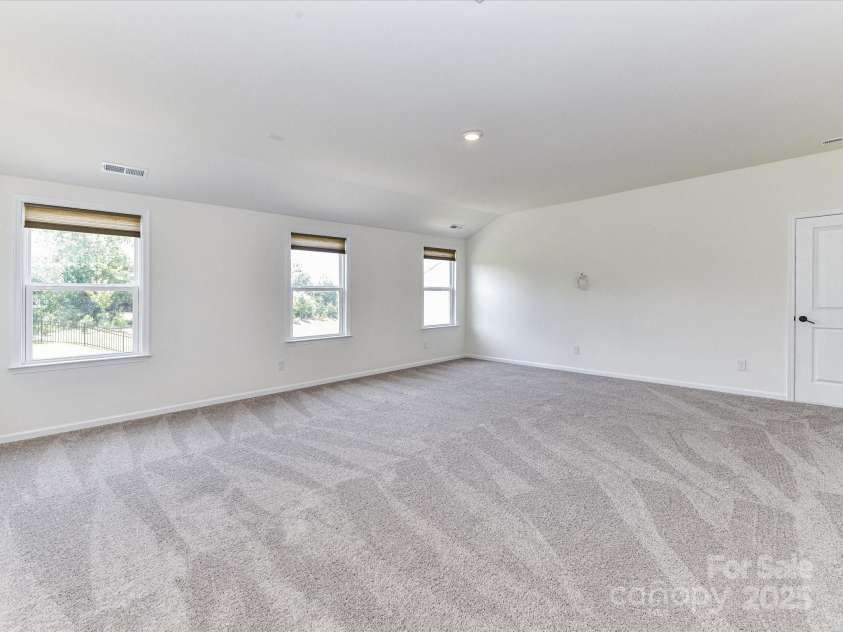 104 Hemlock Cove Court, Mooresville, NC 28117.  MLS# CAR4280117, YatesRealty ID 16272. Large Bonus Room with great natural light!