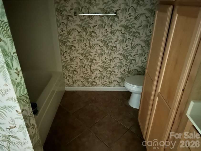 94 Blackberry Trail, Sapphire, NC 28774.  MLS# CAR4352189, YatesRealty ID 16281. Basement Guest Bath