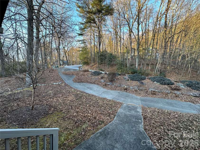94 Blackberry Trail, Sapphire, NC 28774.  MLS# CAR4352189, YatesRealty ID 16281. Front View