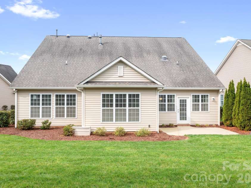 12728 Meetinghouse Drive, Cornelius, NC 28031.  MLS# CAR4361291, YatesRealty ID 16284. Back of home