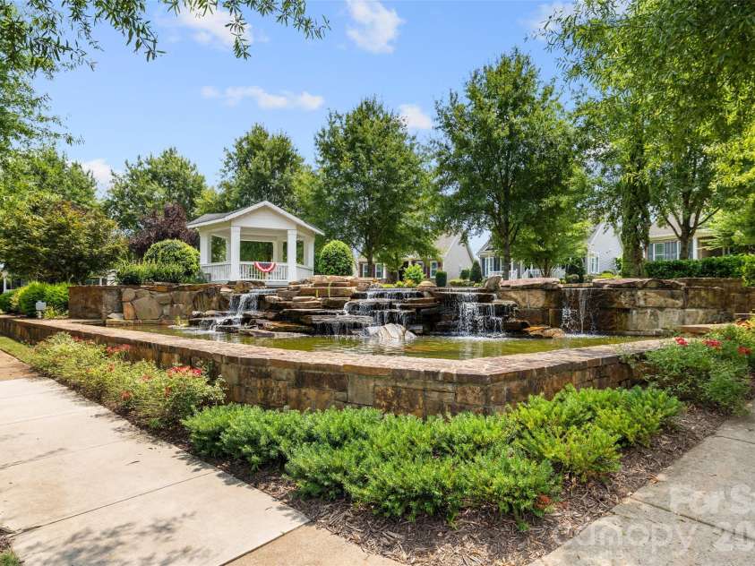 12728 Meetinghouse Drive, Cornelius, NC 28031.  MLS# CAR4408825, YatesRealty ID 16284. Pavillion & waterfall