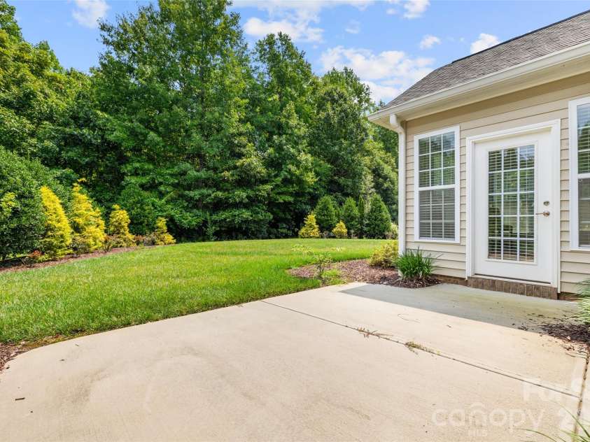 12728 Meetinghouse Drive, Cornelius, NC 28031.  MLS# CAR4408825, YatesRealty ID 16284. Private backyard