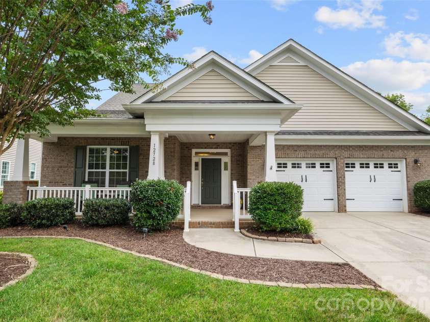 12728 Meetinghouse Drive, Cornelius, NC 28031.  MLS# CAR4408825, YatesRealty ID 16284. Spacious covered front porch