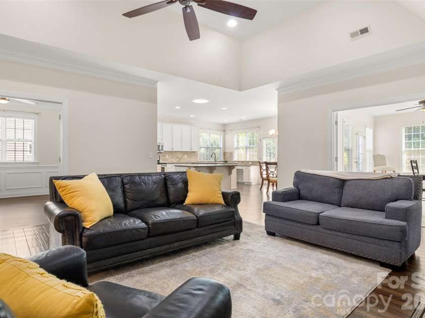 12728 Meetinghouse Drive, Cornelius, NC 28031.  MLS# CAR4408825, YatesRealty ID 16284. Spacious open great room with deep tray ceiling