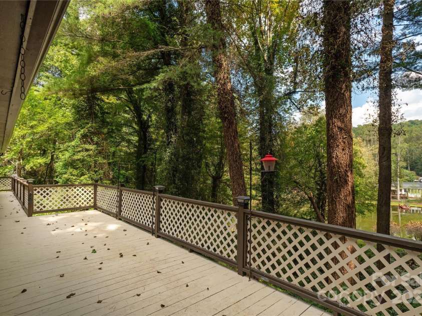 1010 Indian Hill Road, Hendersonville, NC 28791.  MLS# CAR4187228, YatesRealty ID 16286. Deck with view of the lake