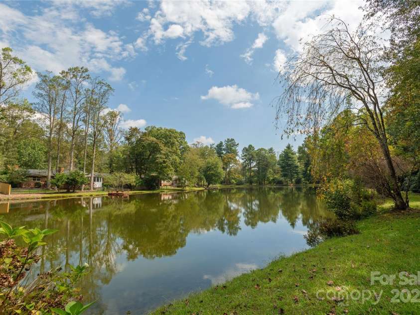 1010 Indian Hill Road, Hendersonville, NC 28791.  MLS# CAR4187228, YatesRealty ID 16286. Lake