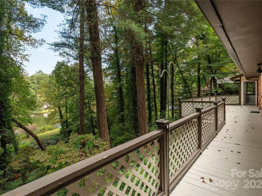1010 Indian Hill Road, Hendersonville, NC 28791.  MLS# CAR4187228, YatesRealty ID 16286. Lake views