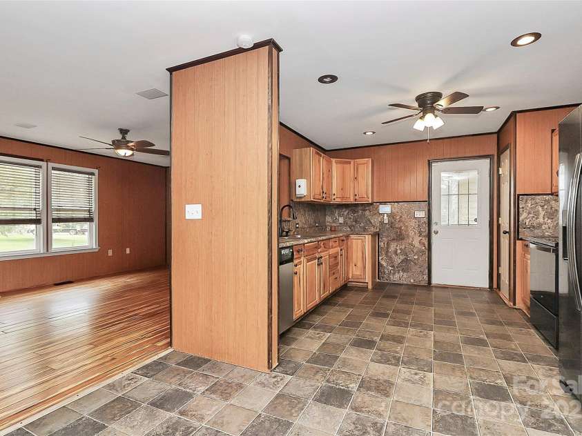 2614 Reepsville Road, Lincolnton, NC 28092.  MLS# CAR4293912, YatesRealty ID 16292. Kitchen, living room and living room 