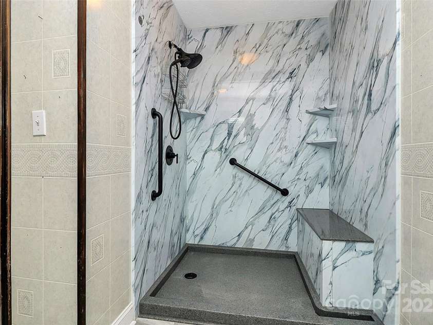 2614 Reepsville Road, Lincolnton, NC 28092.  MLS# CAR4293912, YatesRealty ID 16292. Newly renovated primary bathroom