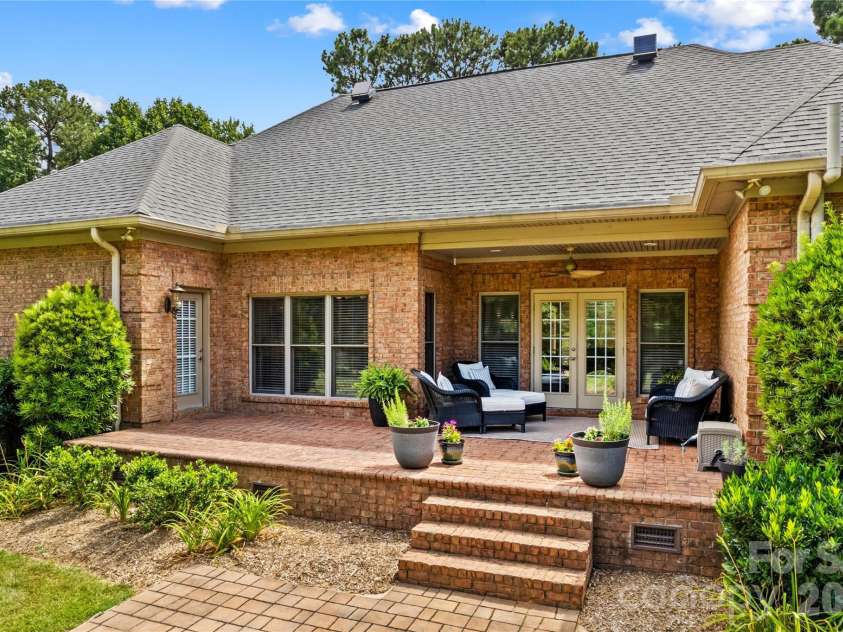 107 Kenway Loop, Mooresville, NC 28117.  MLS# CAR4398278, YatesRealty ID 16293. Back View of Brick Terrace