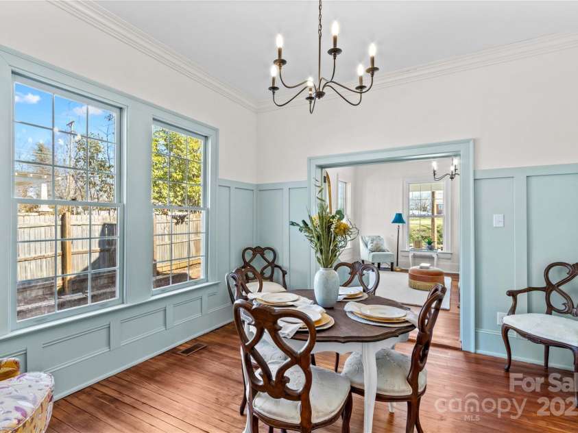 506 Church Street, Salisbury, NC 28144.  MLS# CAR4218717, YatesRealty ID 16294. DR looking back toward the living room. Note the privacy fence along the driveway.