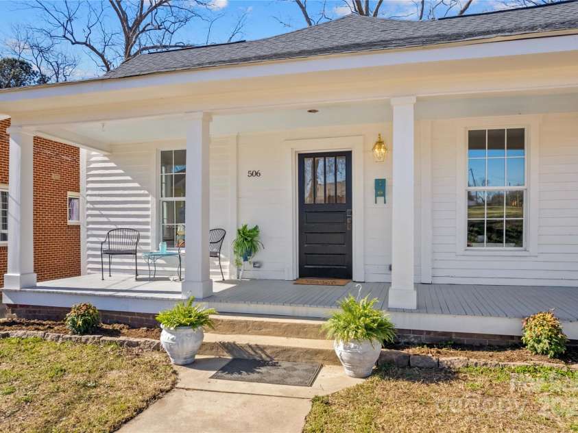 506 Church Street, Salisbury, NC 28144.  MLS# CAR4218717, YatesRealty ID 16294. Front door is typical of the Greek Revival period with 4 glass panes. Mailbox came with the house but we gave it a  a facelift.