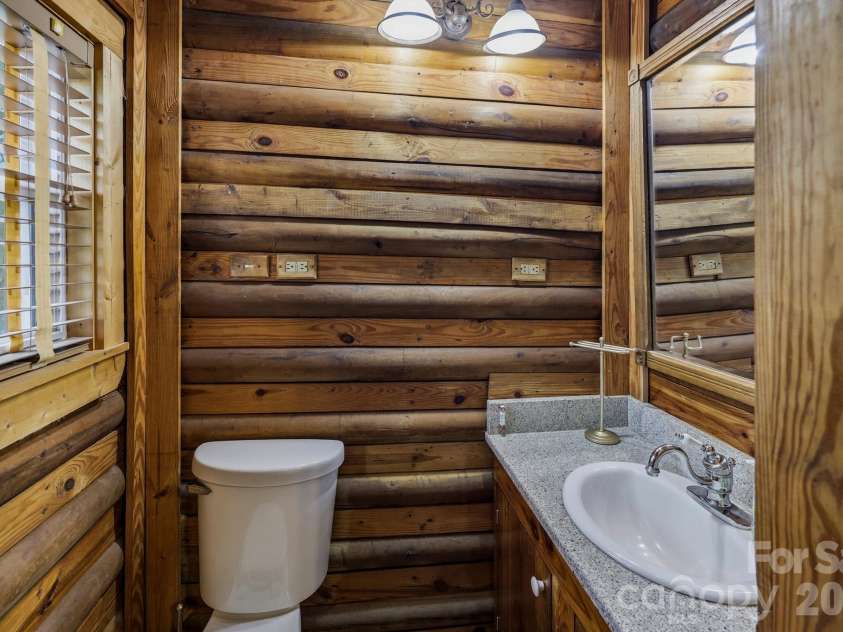 118 Rock Point Road, Lake Lure, NC 28746.  MLS# CAR4365667, YatesRealty ID 16303. 