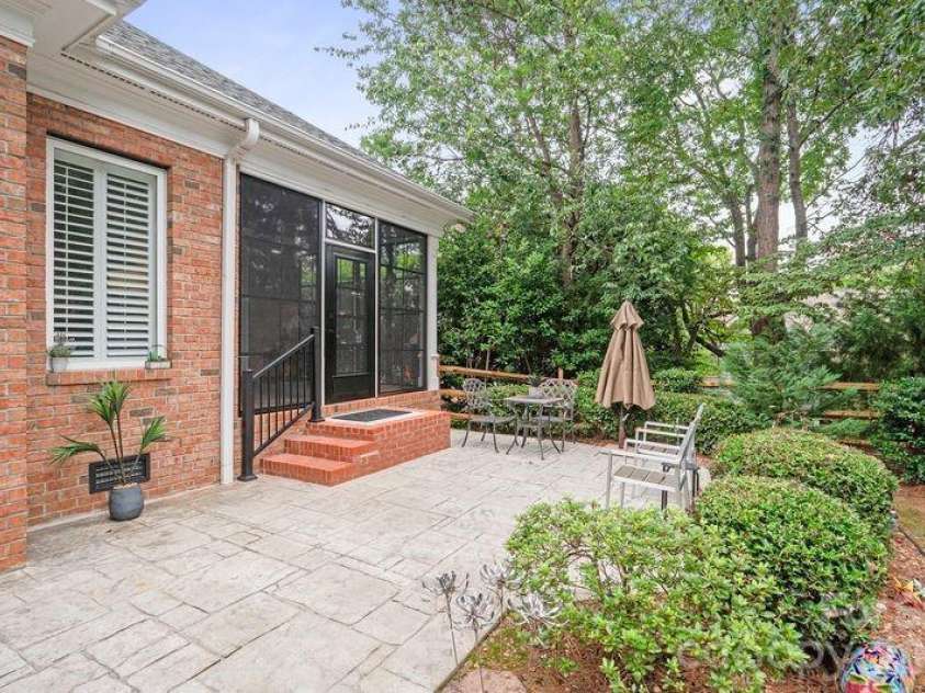 17426 Springwinds Drive, Cornelius, NC 28031.  MLS# CAR4333275, YatesRealty ID 16307. Back patio space off EZ Breeze porch