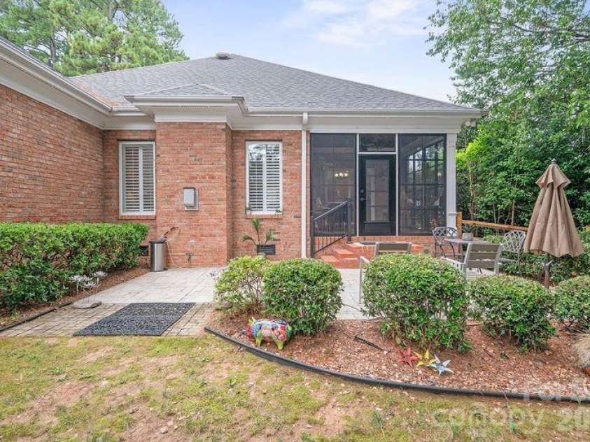 17426 Springwinds Drive, Cornelius, NC 28031.  MLS# CAR4333275, YatesRealty ID 16307. Back yard toward porches