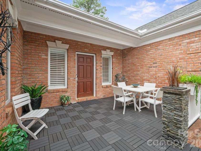 17426 Springwinds Drive, Cornelius, NC 28031.  MLS# CAR4333275, YatesRealty ID 16307. Front porch is somewhat private and a nice stop for morning coffee