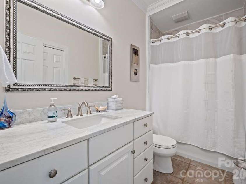 17426 Springwinds Drive, Cornelius, NC 28031.  MLS# CAR4333275, YatesRealty ID 16307. Full bath off hallway quartz countertop