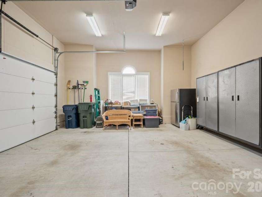 17426 Springwinds Drive, Cornelius, NC 28031.  MLS# CAR4333275, YatesRealty ID 16307. Large garage space and tons of storage