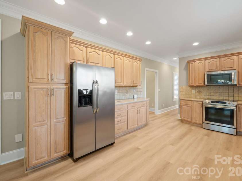 17426 Springwinds Drive, Cornelius, NC 28031.  MLS# CAR4333275, YatesRealty ID 16307. New floors flow perfectly in the home
